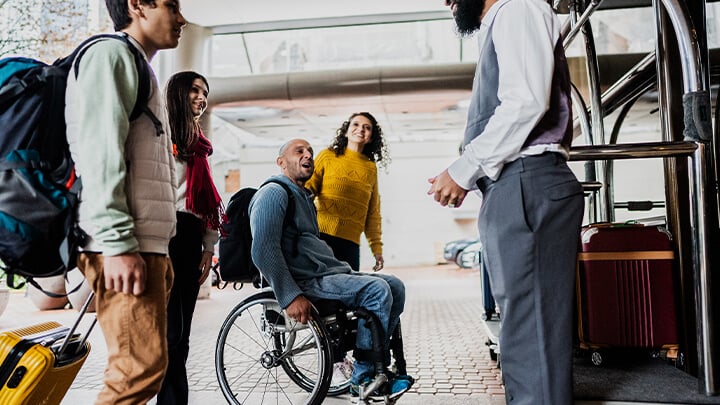 Family talking with consierge